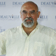 Stuart Gordon flexes his muscles at the 31st Deauville Festival Of American Film on September 9, 2005 in Deauville, France.